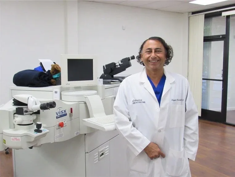 Dr. Rajesh Khanna, board-certified eye surgeon, in his white coat at Khanna Vision Institute